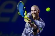 Adrian Mannarino plays a backhand